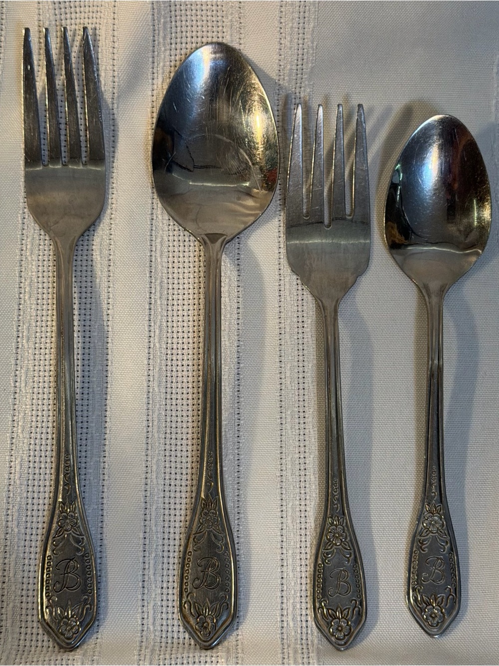 4 Pc Monogram “B” Flatware 1 dinner fork, 1 salad fork, 1 tablespoon, 1 teaspoon